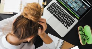 Woman sad at work desk